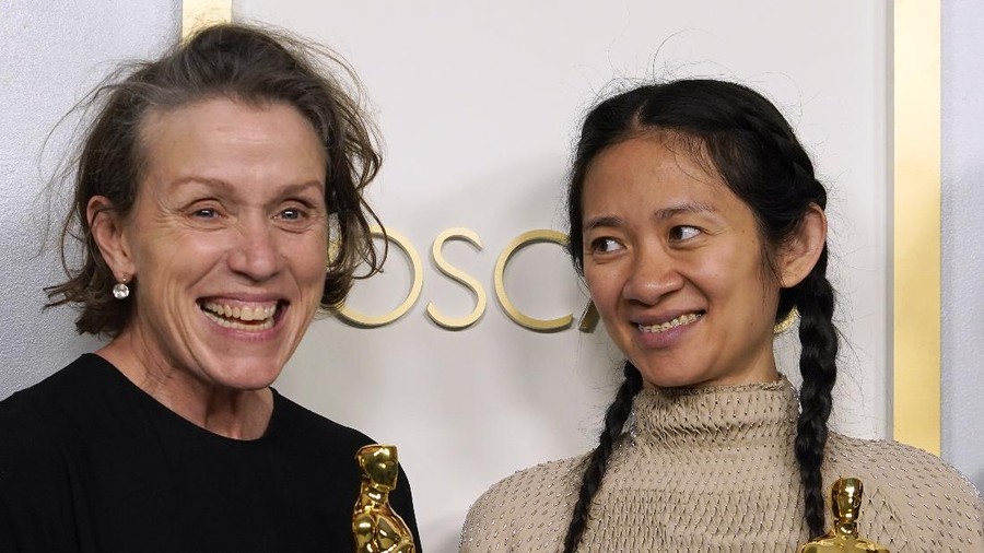 Director/Producer Chloe Zhao, winner of the award for best picture for "Nomadland," poses in the press room at the Oscars on Sunday, April 25, 2021, at Union Station in Los Angeles. (AP Photo/Chris Pizzello, Pool)