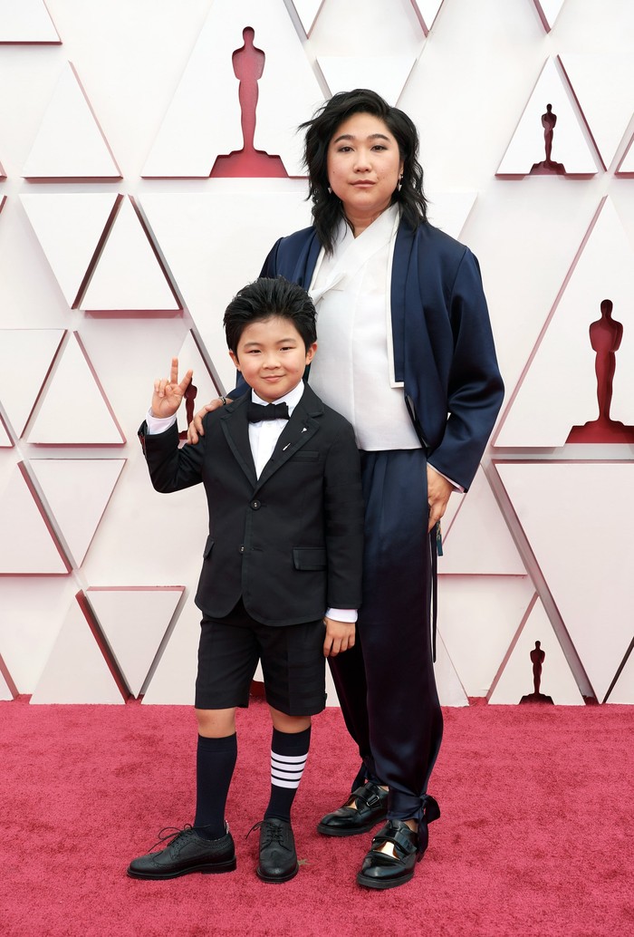 Alan dan Vicky Kim dengan matching suit dari Thom Browne. Foto: vogue.com