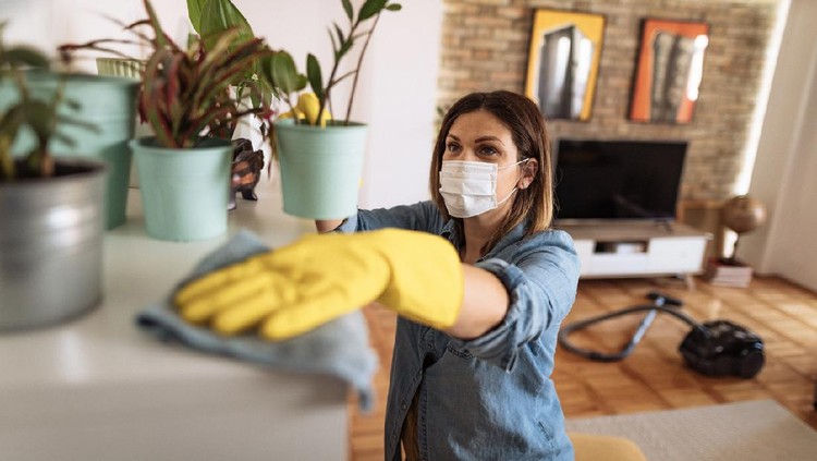 Ilustrasi ART Infal Woman working at home, cleaning the floors, washing the laundry and cleaning up the mess in the closet during quarantine