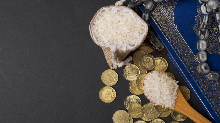Coins, rosary, Holy Quran and rice in the sack. Zakat concept. Zakat is a form of alm-giving as a religious obligation or tax. Large Arab word right method to read correctly.