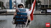 FOTO: Aksi Damai Jaga Laut Tolak Limbah Nuklir Jepang Belasan Pemuda Peduli Lingkungan dan Kelestarian Alam, menggelar aksi damai menolak rencana Jepang membuang 1 juta ton lebih air limbah.