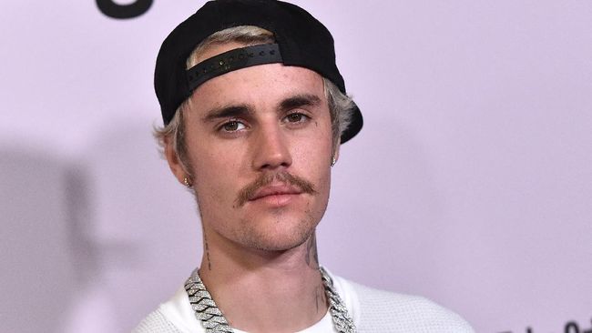 Justin Bieber akan mengadakan tur The Justice World Tour 2022, meski jadwal yang baru diumumkan hanya berada di Amerika Utara.