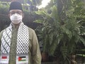 Anies Kenakan Serban Bendera Palestina saat Salat Ied