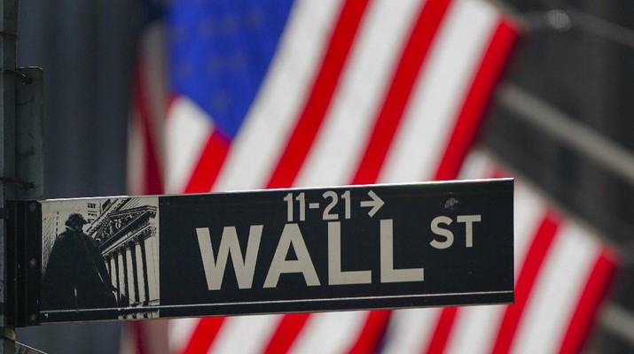 FILE - In this Oct. 14, 2020 file photo, the American Flag hangs outside the New York Stock Exchange in New York.Stocks were posting strong gains in early trading Thursday, May 13, 2021, following three days of losses and the biggest one-day drop in the S&P 500 since February.  (AP Photo/Frank Franklin II, File)