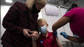 FOTO: AS Vaksinasi Anak Usia 12-15 Tahun Pakai Vaksin Pfizer Amerika Serikat mulai membagikan vaksin corona buatan Pfizer kepada anak berusia 12-15 tahun.