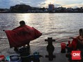 FOTO: Berbagi Kehidupan dengan Sungai Musi