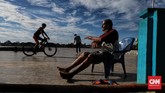 FOTO: Berbagi Kehidupan dengan Sungai Musi Sepanjang 750 km, Sungai Musi membelah Kota Palembang menjadi dua bagian. Jembatan Ampera melintas di atas sungai ini.
