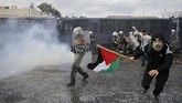 FOTO: Dari Penjuru Dunia untuk Palestina, Kecam Israel Warga dan pendukung Palestina di seluruh penjuru dunia turun ke jalan mengecam Israel atas serangan di Jalur Gaza yang menewaskan banyak korban sipil.