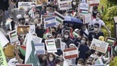 FOTO: Dari Penjuru Dunia untuk Palestina, Kecam Israel Warga dan pendukung Palestina di seluruh penjuru dunia turun ke jalan mengecam Israel atas serangan di Jalur Gaza yang menewaskan banyak korban sipil.