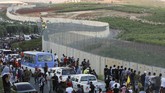 FOTO: Dari Penjuru Dunia untuk Palestina, Kecam Israel Warga dan pendukung Palestina di seluruh penjuru dunia turun ke jalan mengecam Israel atas serangan di Jalur Gaza yang menewaskan banyak korban sipil.