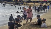 FOTO: Kerumunan Anyer Berujung Penutupan Tempat Wisata Banten Seluruh tempat wisata di Banten ditutup sejak 15 sampai 30 Mei 2021. Penutupan untuk mencegah kerumunan seperti terjadi di Anyer, beberapa hari terakhir.