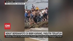VIDEO: Nekat Berswafoto di Bibir Karang, Pasutri Terjatuh