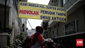 FOTO: Meninjau Tes Covid Warga Jakarta Usai Mudik Hari Raya