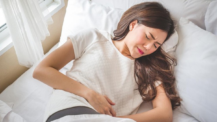 862642960 Asian woman stomachache, feel pain for period conceptAsian woman stomachache, feel pain for period concept