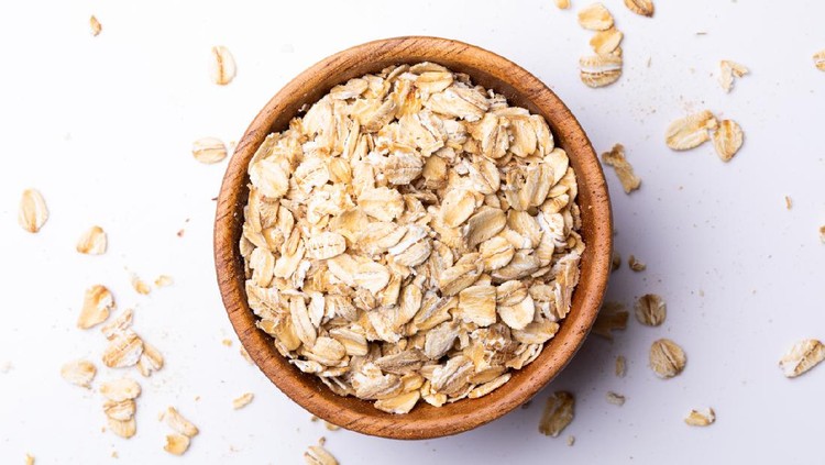 Oatmeal in a wooden bowl