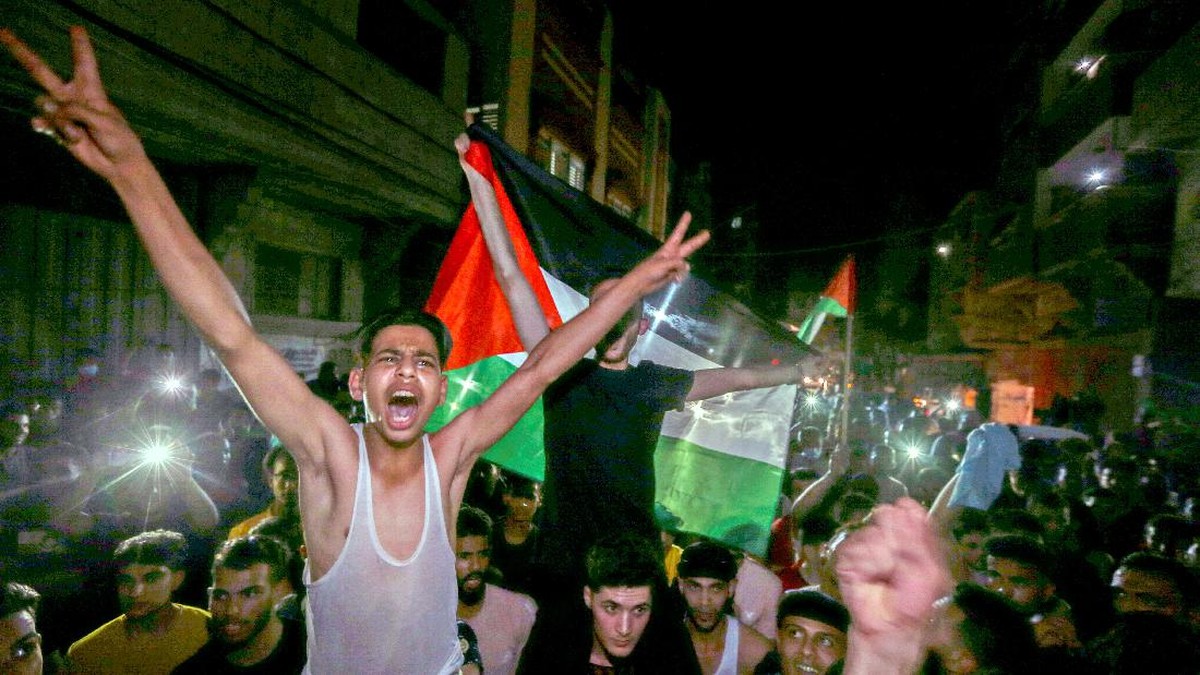 FOTO: Sorak Warga Gaza Sambut Gencatan Senjata Hamas-Israel