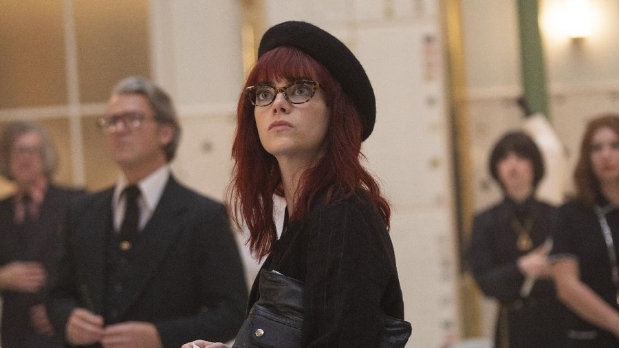This image released by Disney shows Emma Stone in a scene from "Cruella." (Laurie Sparham/Disney via AP)