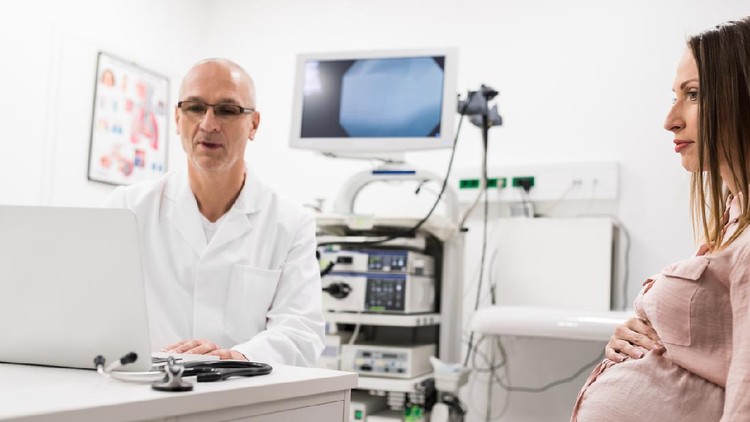 usg Pregnant woman and doctor in hospital
