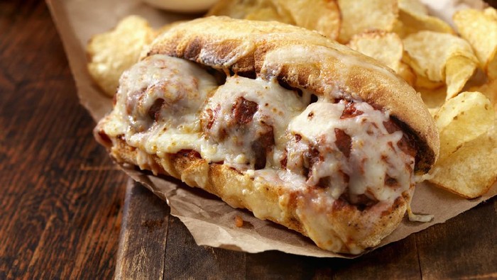 Meatball Sandwich with Marinara Sauce, Melted Mozzarella Cheese, Potato Chips and Dipping Sauce -Photographed on Hasselblad H3D2-39mb Camera