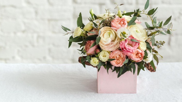 bouquet of beautiful rose and white flowers white brick wall romantic