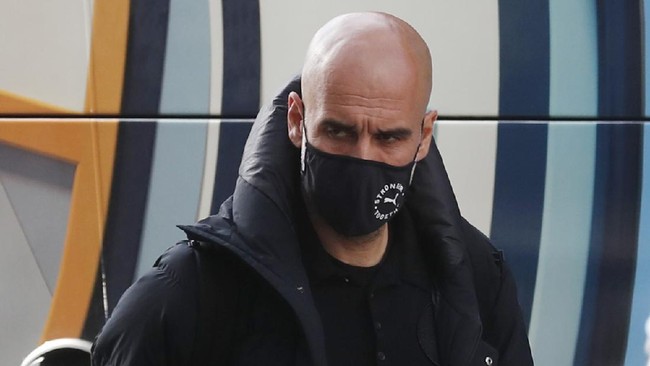 Manchester City kritis jelang Piala FA melawan Swindon Town setelah pelatih Pep Guardiola terkonfirmasi positif Covid-19 pada Kamis (6/1).
