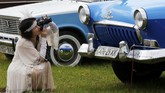 FOTO: Deretan Mobil Antik di Festival Old Car Land Ukraina Ratusan mobil antik dan langka dipamerkan di festival Old Car Land di Kiev, Ukraina sejak 28 Mei 2021. Ada 700 mobil antik dipamerkan.