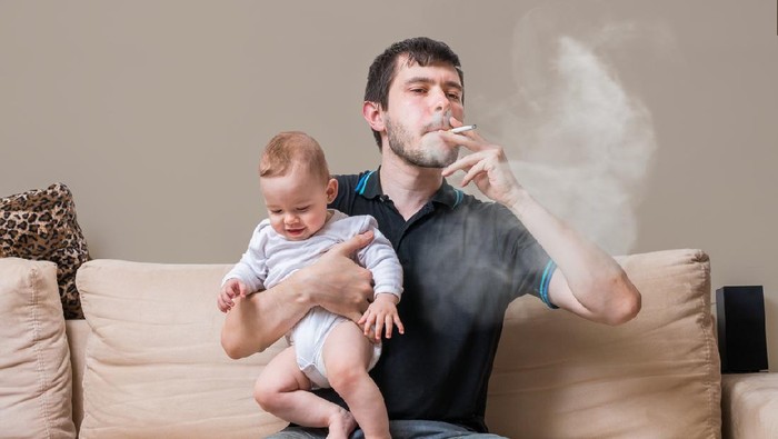 closeup woman hand destroying cigarette stop smoking concept