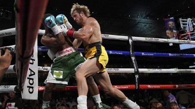 img-title Tak Seperti Tyson, Foreman Nikmati Duel Mayweather vs Logan