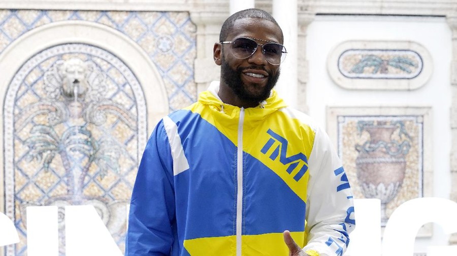 Floyd Mayweather poses for a photograph during a press event, Thursday, June 3, 2021, in Miami Beach, Fla. Mayweather will fight Logan Paul in an exhibition boxing match at the Hard Rock Stadium in Miami Gardens, Fla. Sunday. (AP Photo/Lynne Sladky)