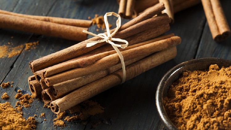Organic Raw Brown Cinnamon on a Background