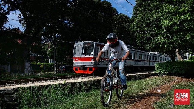 FOTO: Pesepeda MTB Menjajal Jalur Hijau Tengah Kota Jakarta