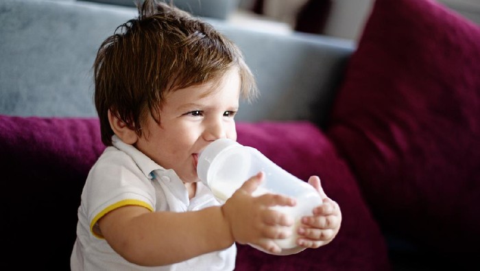Baby boy drinking milk