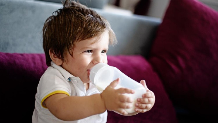 Baby boy drinking milk
