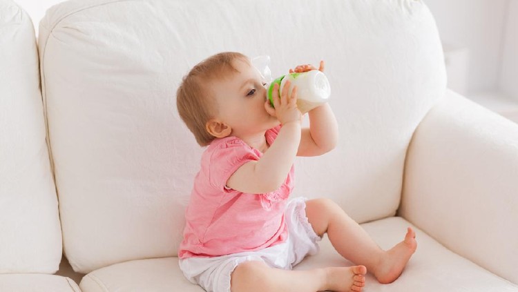 Baby boy drinking milk