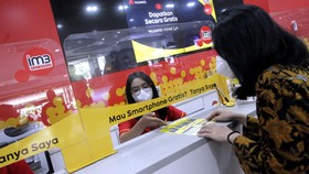4 Syarat Kominfo Soal Izin Merger Indosat-Tri