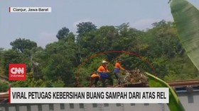 VIDEO: Petugas Kebersihan Buang Sampah Dari Atas Rel