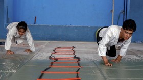 FOTO: Anak Difabel Irak Melawan Pengucilan Lewat Jiu Jitsu