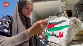 VIDEO: Warga Gaza Melukis di Puing Rumah Usai Serangan Israel