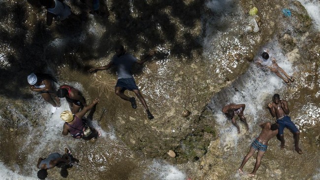 FOTO: Menyucikan Jiwa Lewat Ritual Voodoo Haiti