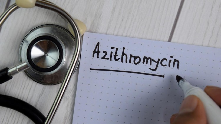 Azithromycin Azithromycin text write on a book isolated on office desk. Healthcare/Medical concept