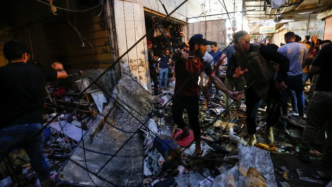 FOTO: Ledakan di Pasar Irak Jelang Iduladha, 35 Orang Tewas