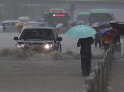 Banjir Dahsyat di China Telan 25 Korban Jiwa