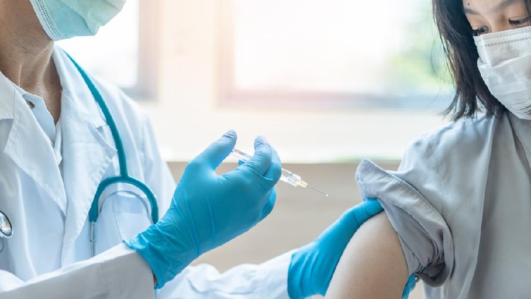 vaksin Immunization and vaccination for flu shot, influenza, HPV or Covid-19 prevention with young child girl having vaccine injection for World immunization week and International HPV awareness day