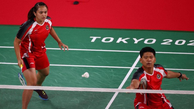 Praveen Jordan/Melati Daeva menang pada laga menegangkan Grup C Olimpiade Tokyo 2020 atas pasangan Australia Simon Wing Hang Leung/Gronya Sommerville.