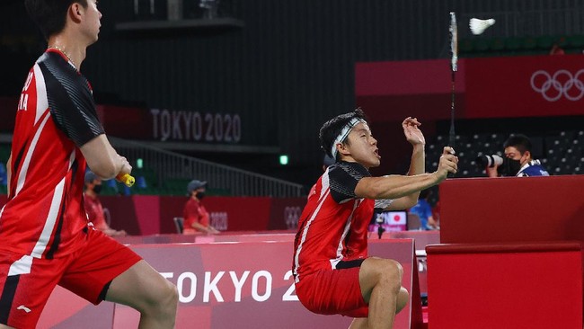 Kevin Sanjaya/Marcus Gideon dipastikan tetap menjadi juara Grup A Olimpiade Tokyo 2020 meski kalah dari Lee Yang/Wang Chi-Lin pada laga terakhir.