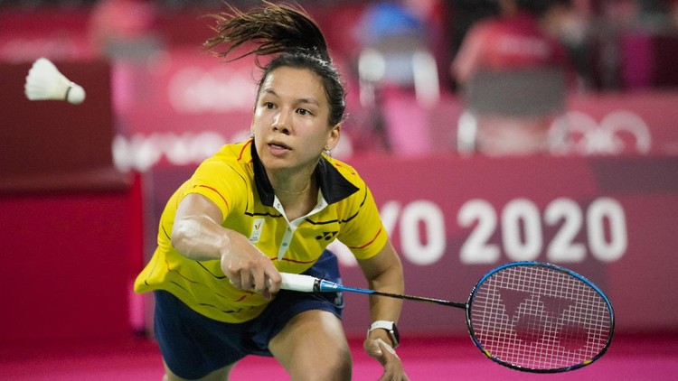 Belgium's Lianne Tan plays against Indonesia's Gregoria Mariska Tunjung during their women's singles group stage badminton match at the 2020 Summer Olympics, Wednesday, July 28, 2021, in Tokyo, Japan. (AP Photo/Dita Alangkara)