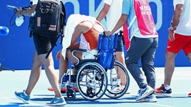 Cuaca Ekstrem Olimpiade, Petenis Digiring dengan Kursi Roda
