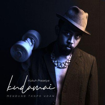 Lirik Lagu Mendung Tanpo Udan - Kudamai