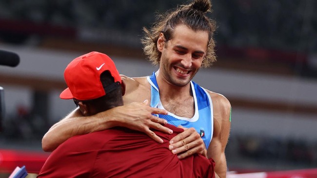 Mutaz Barshim dan Gianmarco Tamberi sepakat membagi dua emas lompat tinggi Olimpiade Tokyo. Berikut kronologi momen bersejarah tersebut.