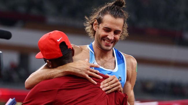 Kronologi Emas Lompat Tinggi Olimpiade Tokyo Dibagi Dua Mutaz Barshim dan Gianmarco Tamberi sepakat membagi dua emas lompat tinggi Olimpiade Tokyo. Berikut kronologi momen bersejarah tersebut.